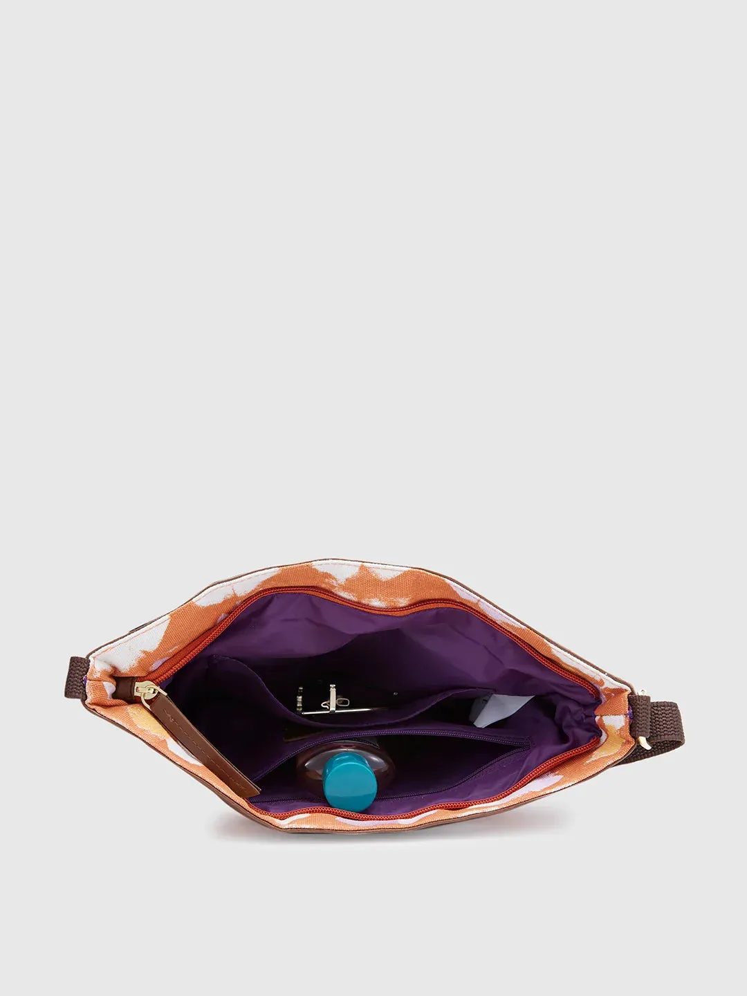 Caprese Enora Large Rust Sling Bag