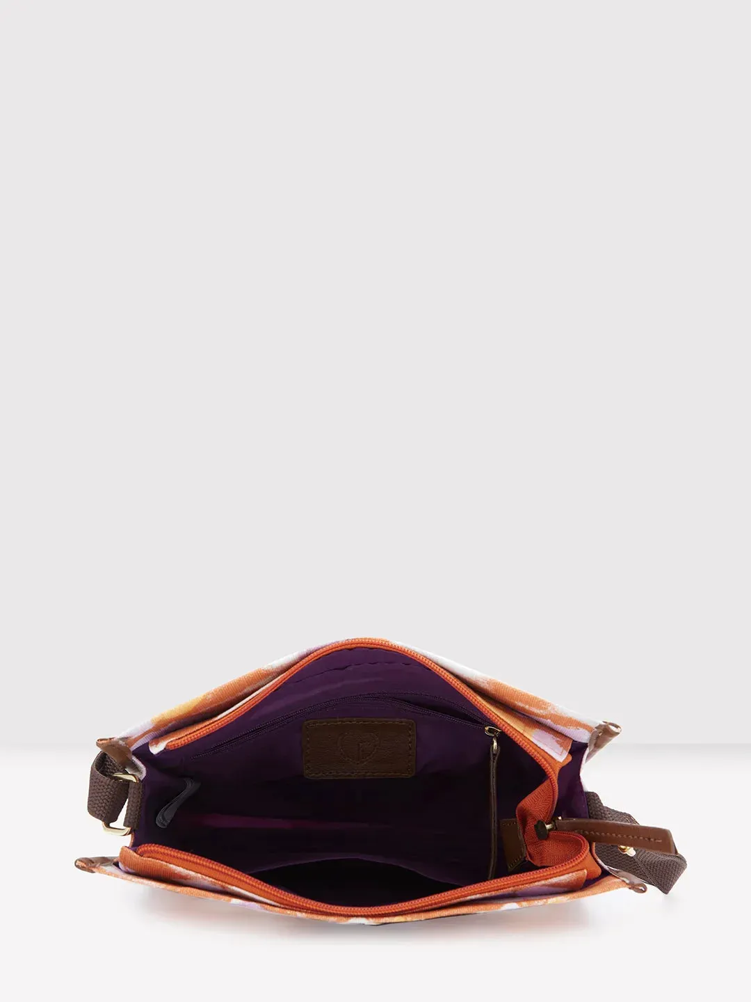 Caprese Enora Medium Rust Sling Bag