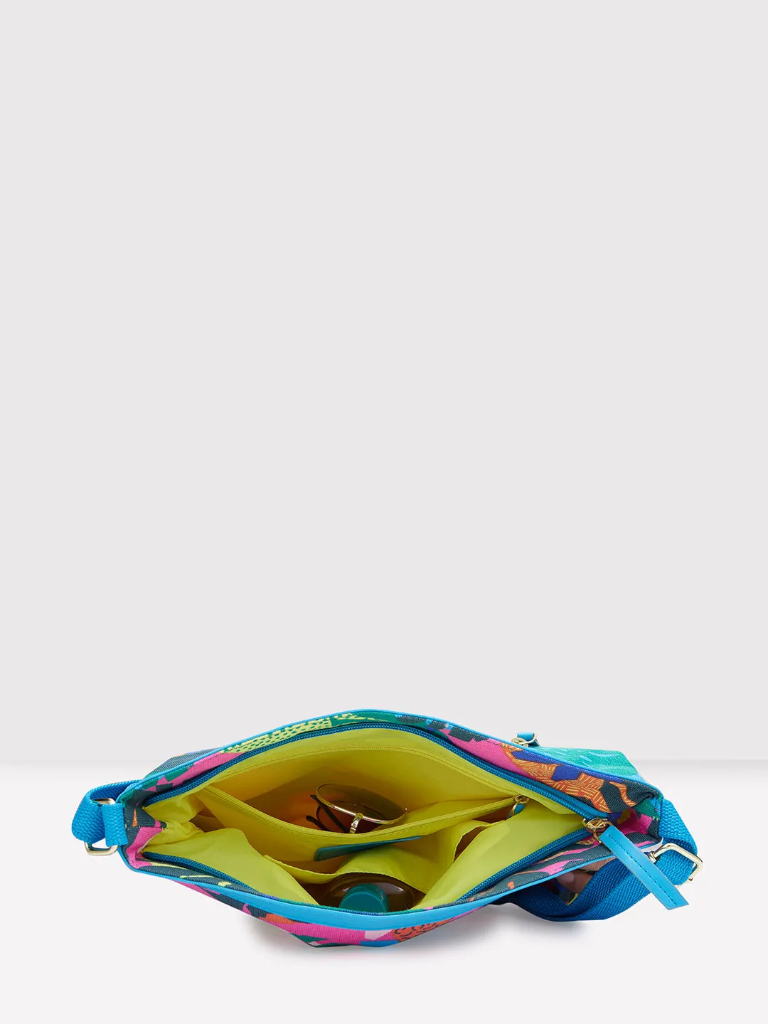 Caprese Octavia Large Fuchsia Sling Bag