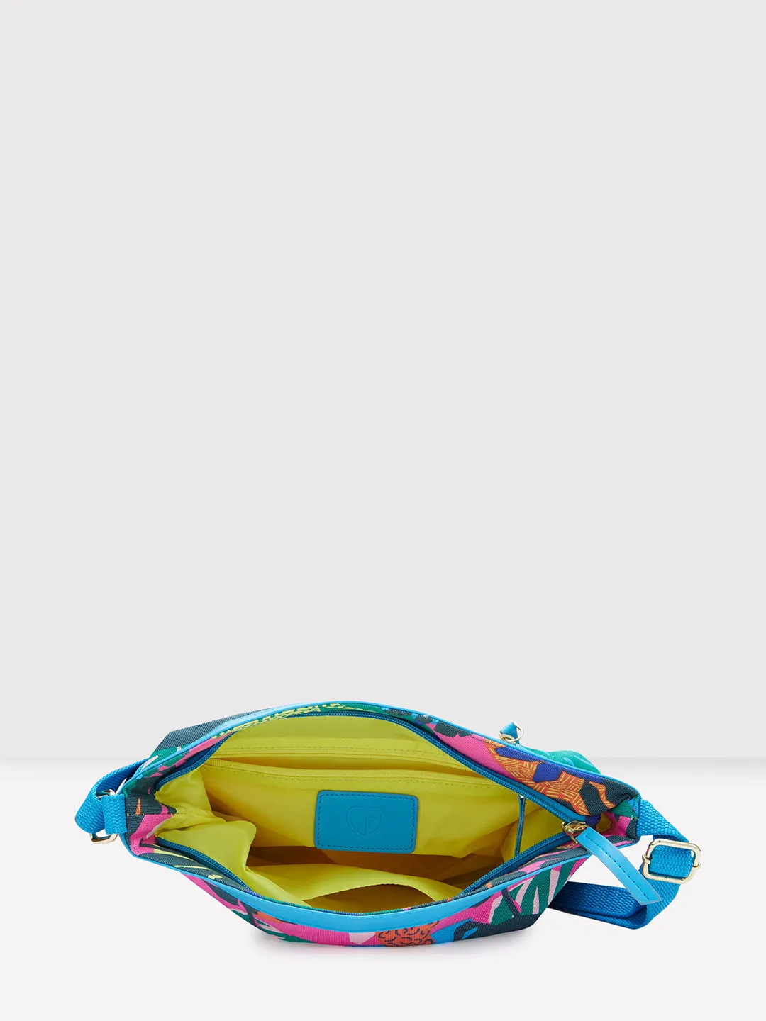 Caprese Octavia Large Fuchsia Sling Bag
