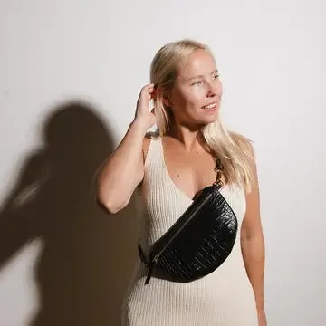 the abby alley croco sling bag